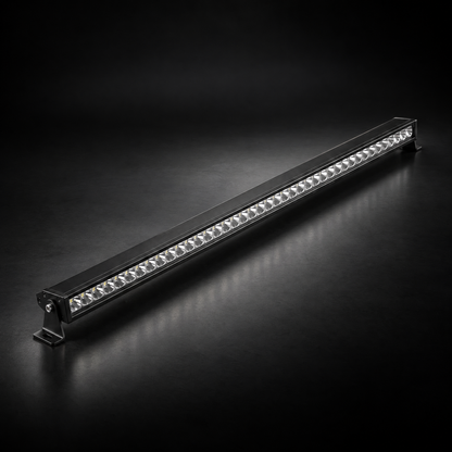 42 inch Whipped 4WD RGB LED light bar, lights off, black aluminium housing and end brackets on a dark studio floor