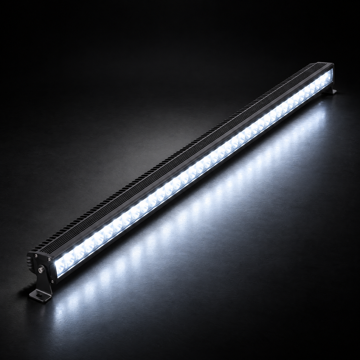 42 inch Whipped 4WD RGB LED light bar in 6000K white driving mode lighting up a dark studio floor