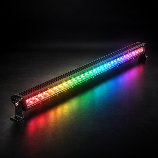 32 inch Whipped 4WD RGB LED light bar lit in chasing rainbow colours, casting coloured light onto a dark studio floor