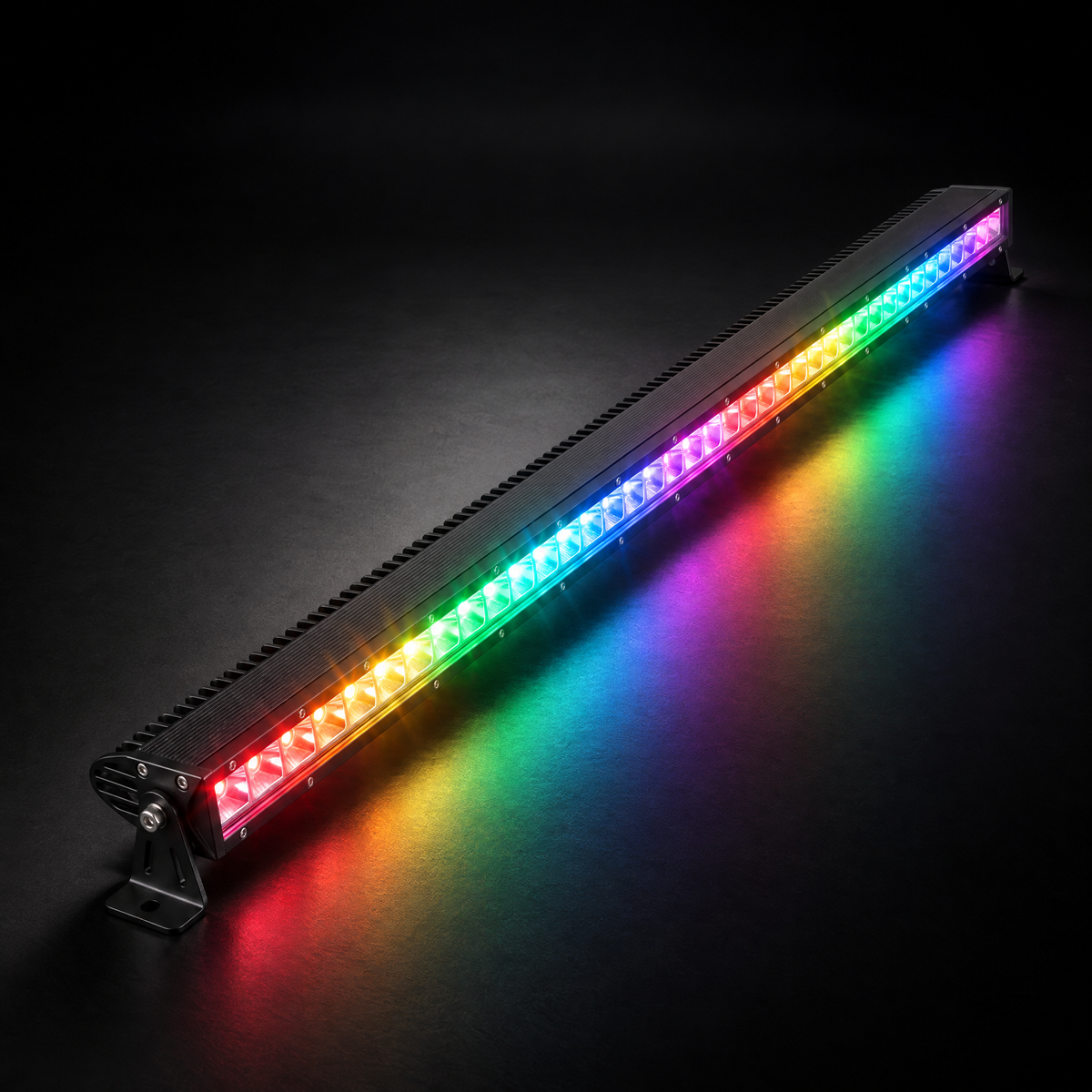 42 inch Whipped 4WD RGB LED light bar lit in chasing rainbow colours, casting coloured light onto a dark studio floor